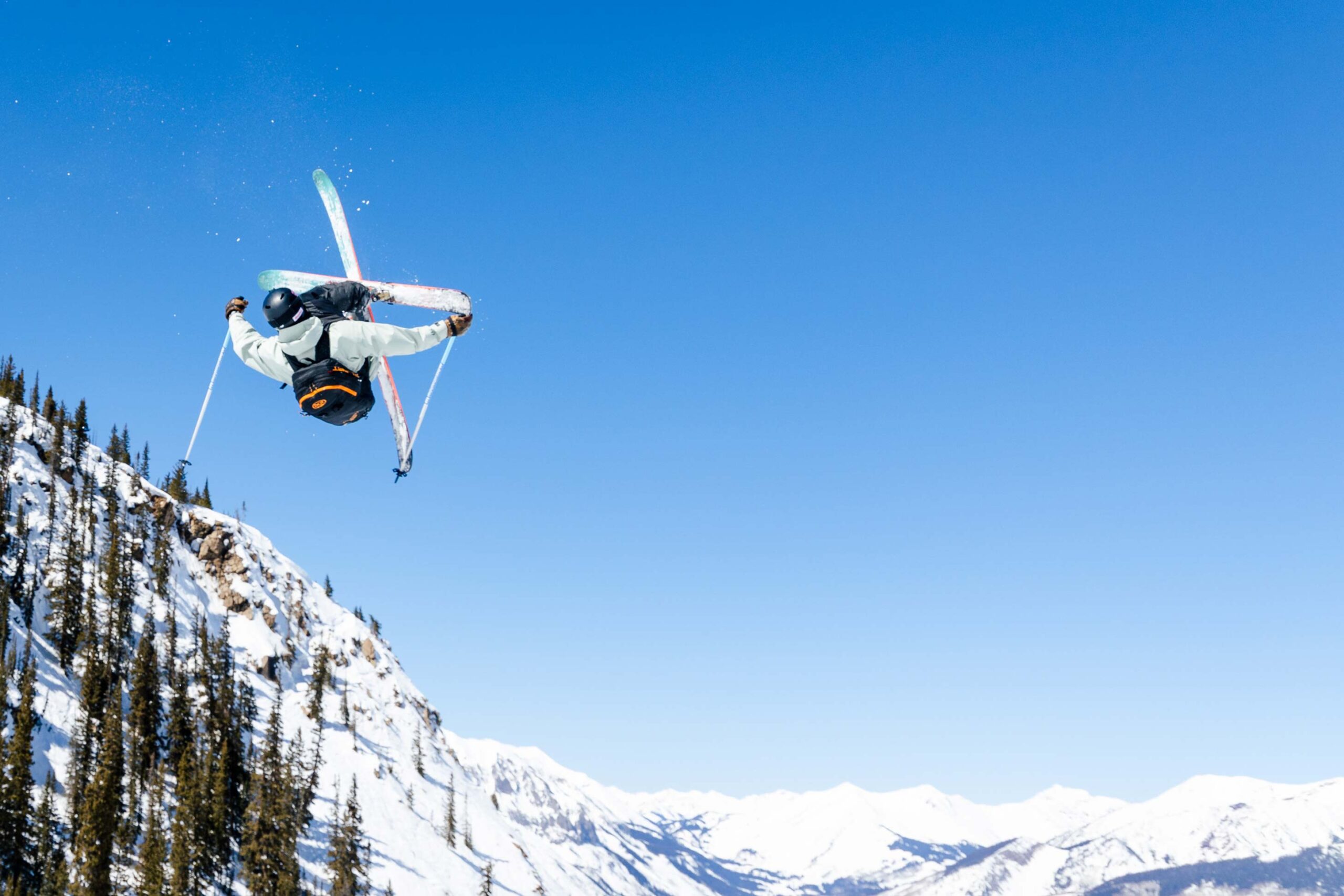 Cal Hill cork 7s on a bluebird day at Crested Butte.